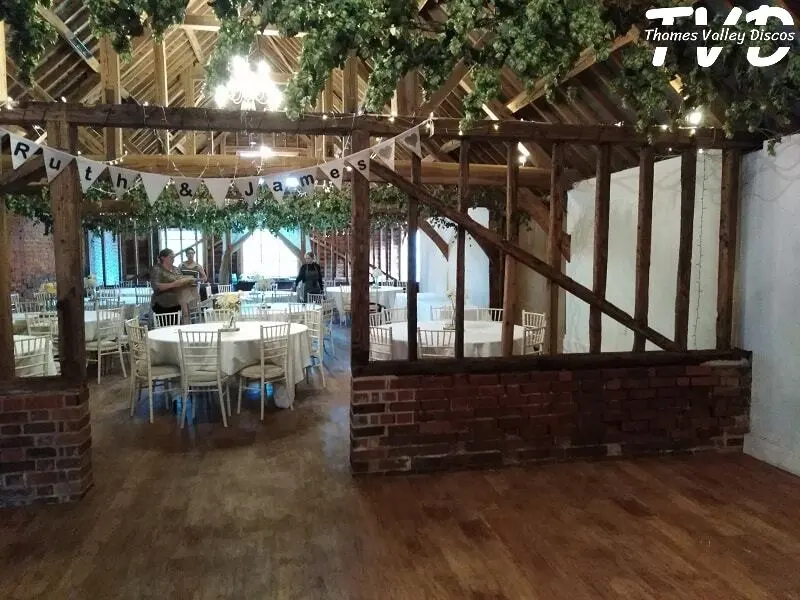 view of the tables and ceiling in the barn