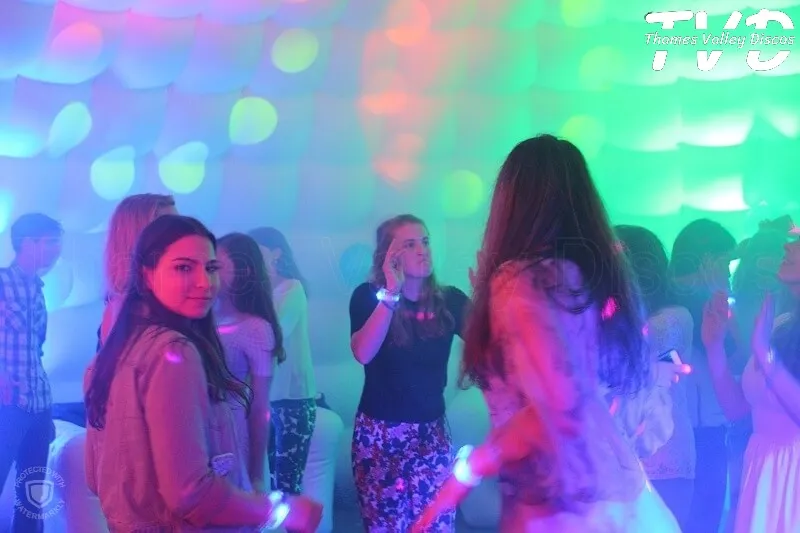 girls dancing looking at the camera