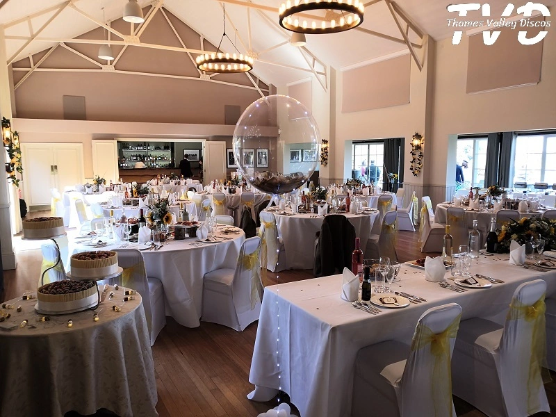 tables set with decorations within the hall